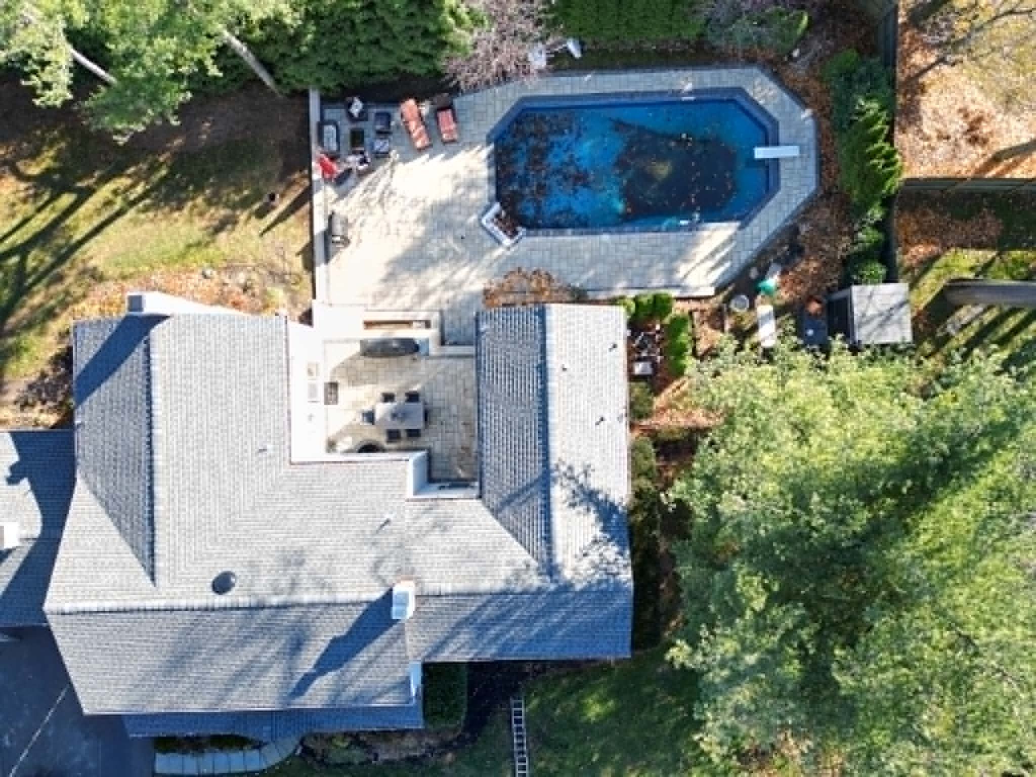 Aerial roof replacement over a backyard pool and patio — Legacy Peak Roofing & Construction, New Jersey