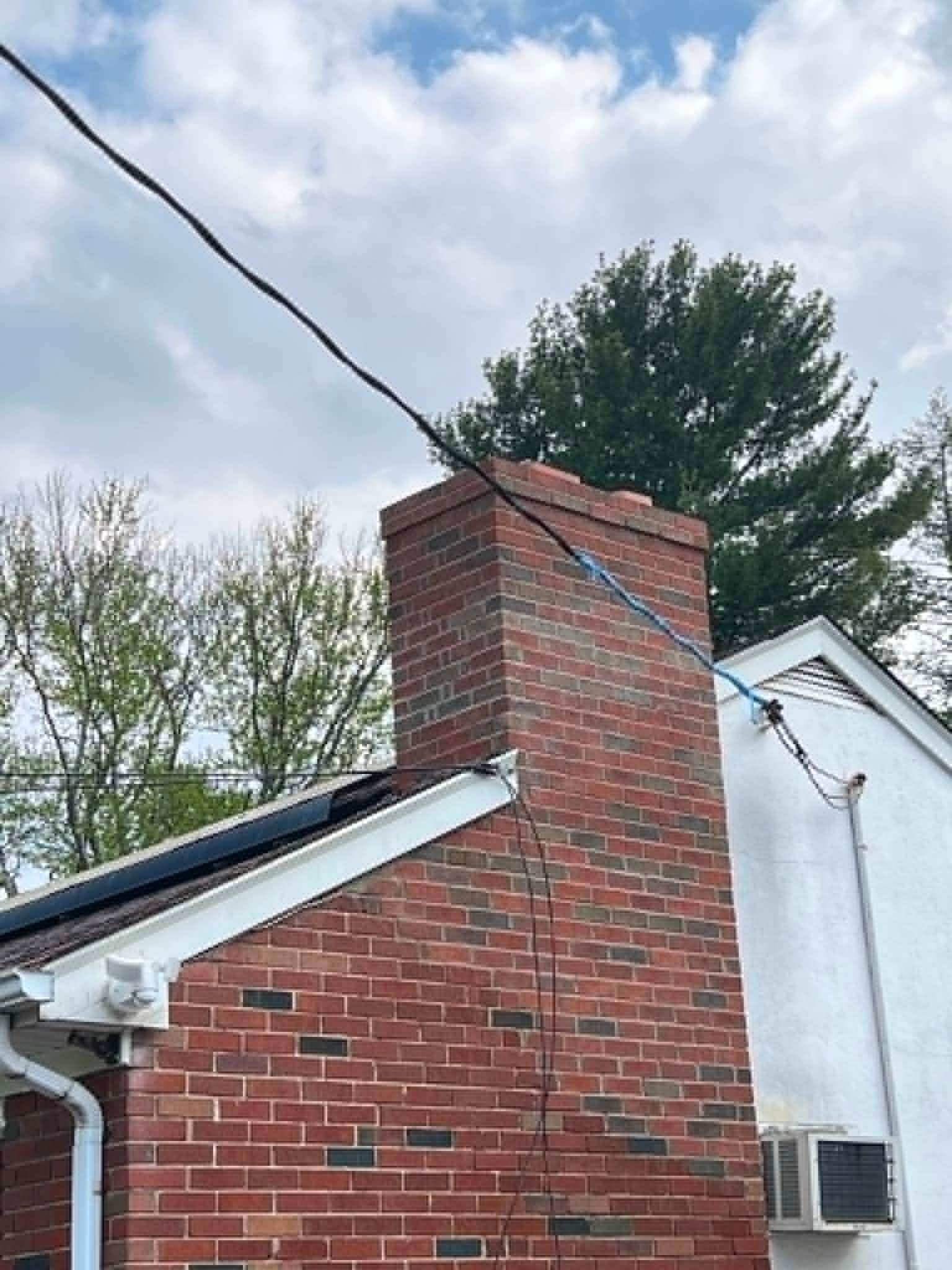 Spalling brick chimney repair — Legacy Peak Roofing & Construction, New Jersey