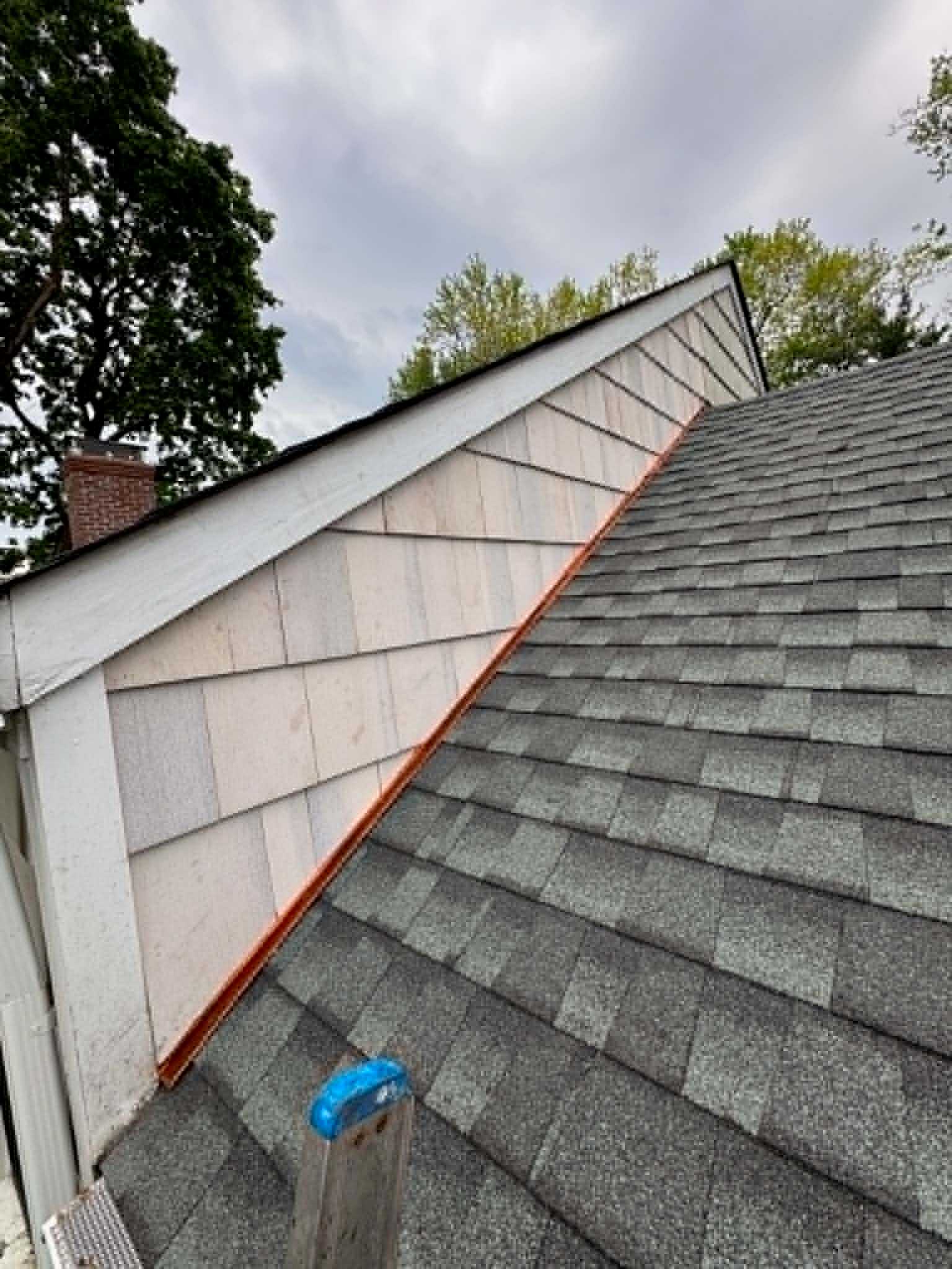 Cedar shake-style shingle dormer with copper valley flashing, New Jersey