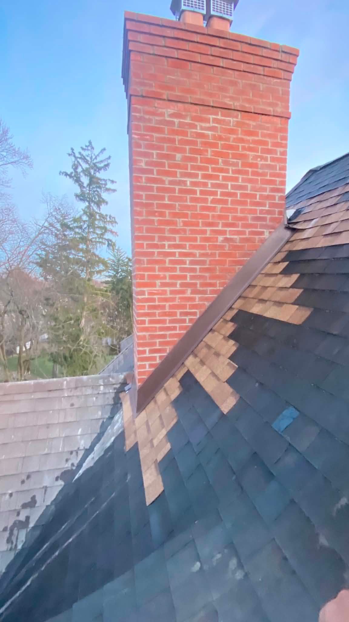 Chimney flashing restoration where it meets the roofline — Legacy Peak Roofing & Construction, New Jersey
