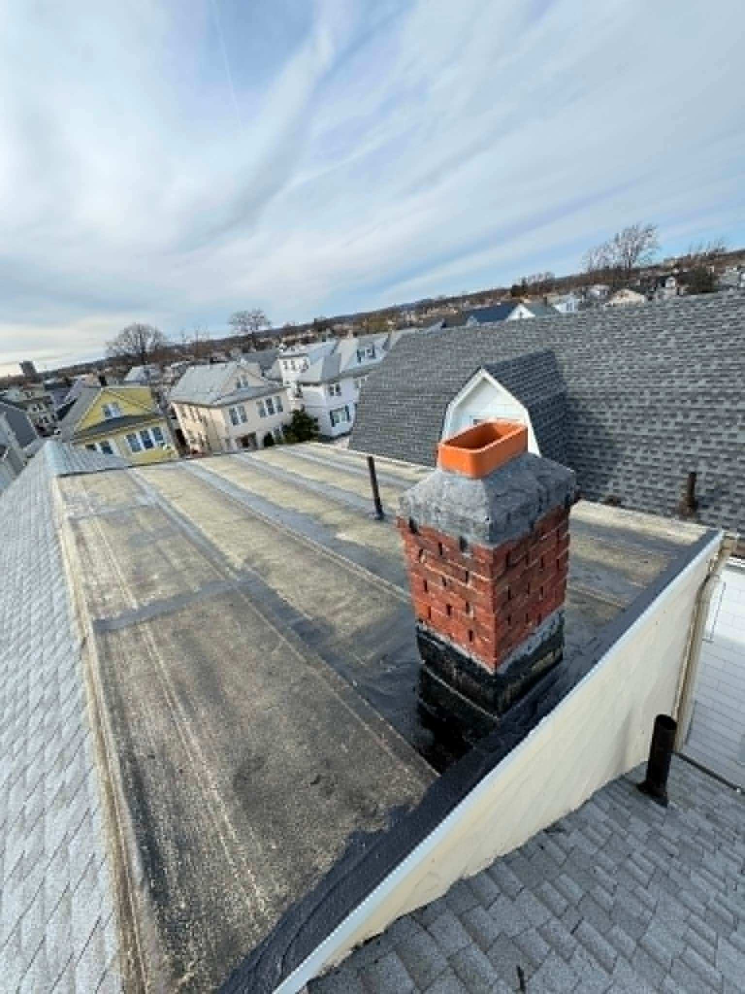 Chimney flue cap on a flat roof — Legacy Peak Roofing & Construction, New Jersey