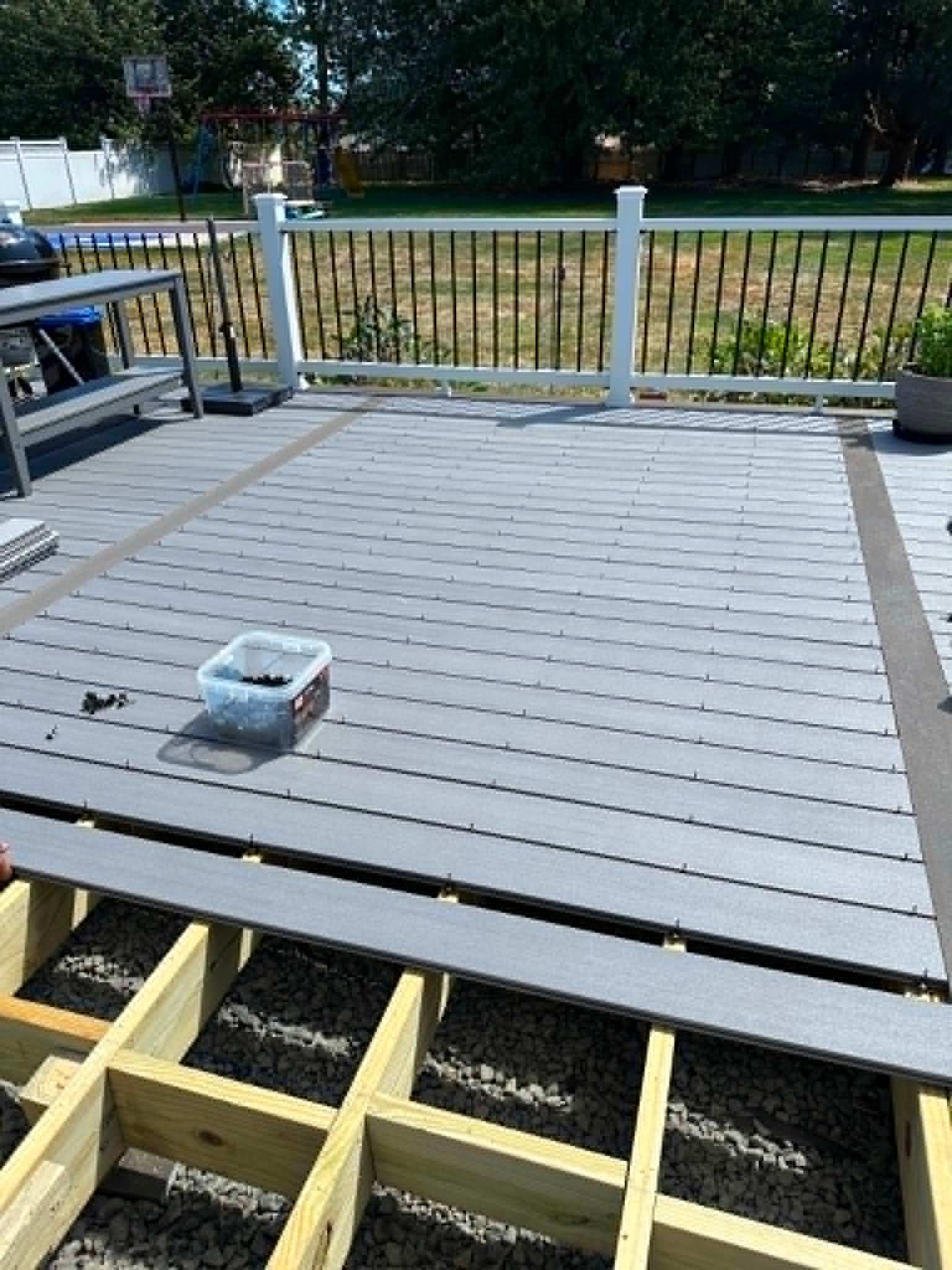 Custom deck board installation in progress — Legacy Peak Roofing & Construction, New Jersey