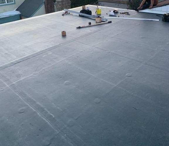 Commercial roof coating application by Legacy Peak Roofing & Construction, New Jersey