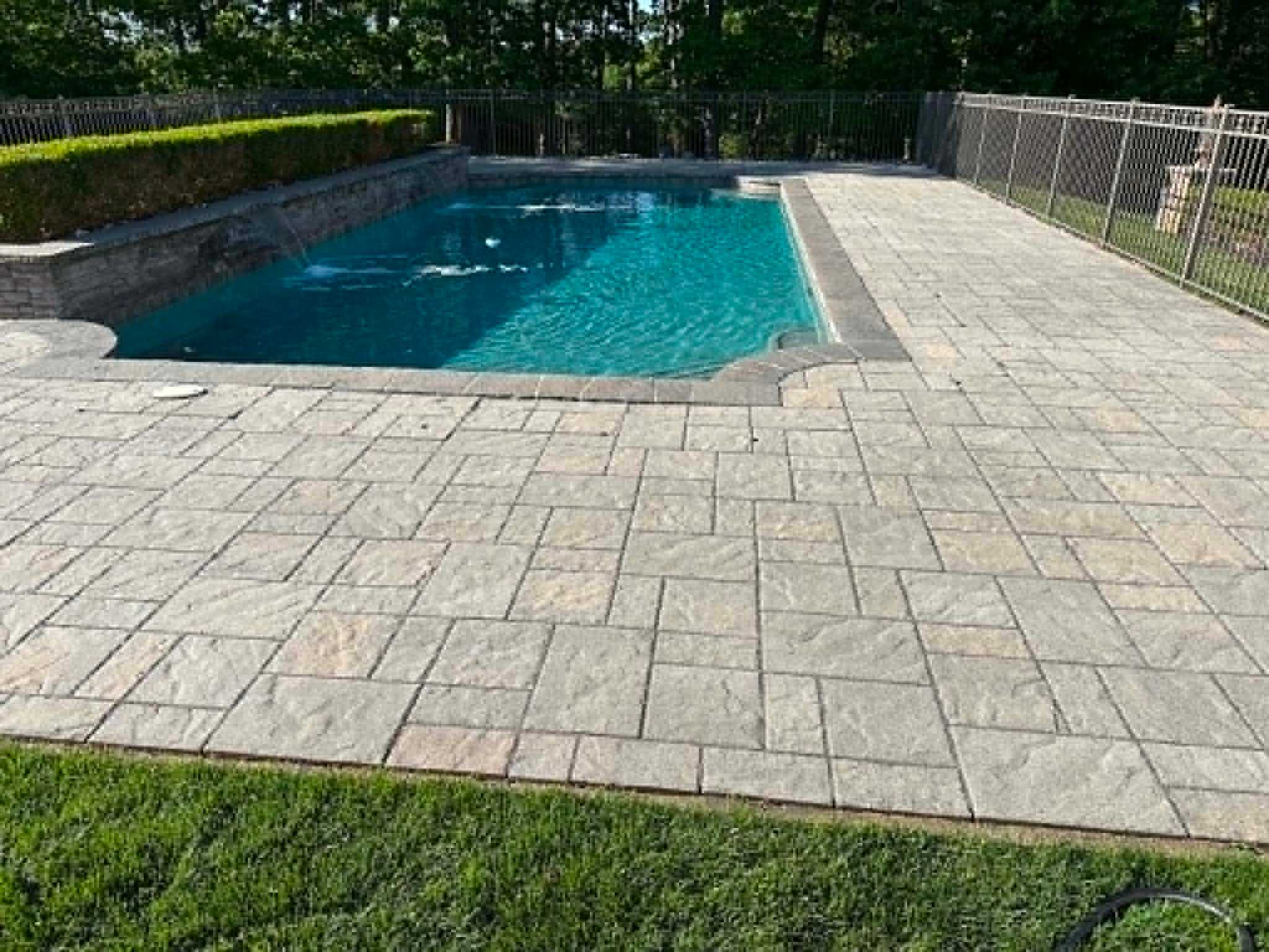 Large-format paver pool patio installed by Legacy Peak Roofing & Construction, Monmouth County NJ