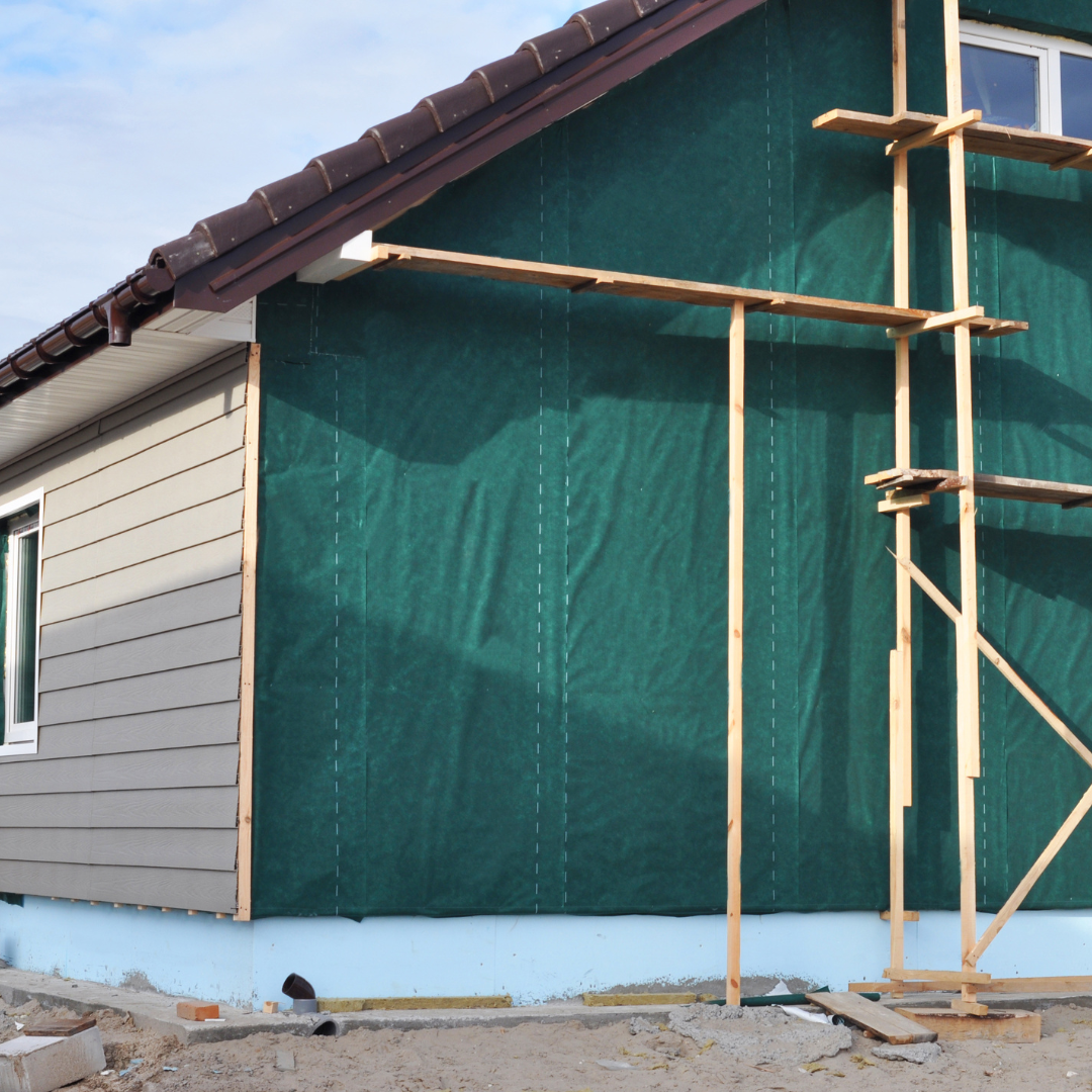 Professional Siding Contractor in Monmouth County NJ | Legacy Peak Construction Siding contractor in Monmouth County NJ installing new vinyl siding.